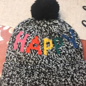 GAP ski hat. Says “happy” in different colors